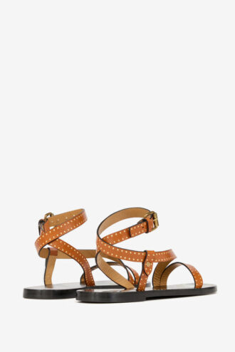 Flache Sandalen aus genietetem Leder von Jopee
