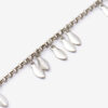 Metallarmband mit glänzenden Blattanhängern