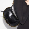 Oskan Moon Schultertasche aus Leder mit Python-Effekt