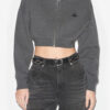 Oxane Kurze Strickjacke aus einfarbigem Strick Oxane Kurze Strickjacke aus einfarbigem Strick