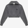 Oxane Kurze Strickjacke aus einfarbigem Strick Oxane Kurze Strickjacke aus einfarbigem Strick