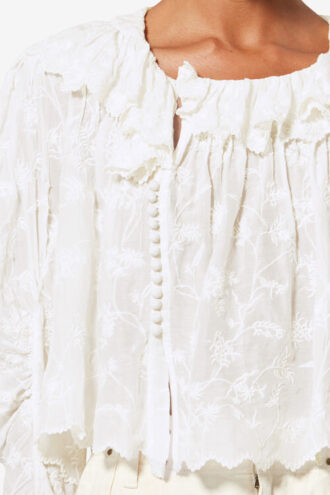 Zelly Rüschenbluse aus Baumwolle und Seide mit Blumenmuster Zelly Rüschenbluse aus Baumwolle und Seide mit Blumenmuster